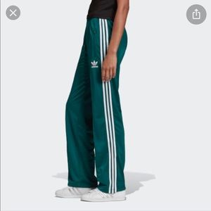 Adidas firebird emerald green track pants.